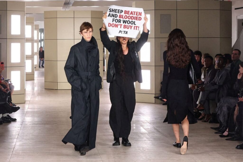 Animal-rights protesters disrupting a COS runway show during New York Fashion Week.