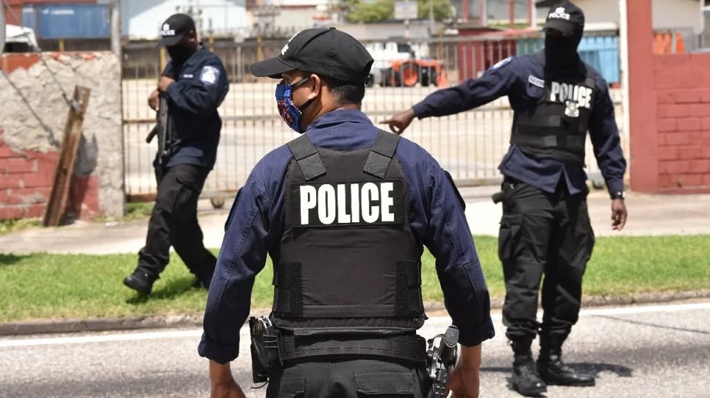 Trinidad and Tobago police officers conducting a security patrol.
