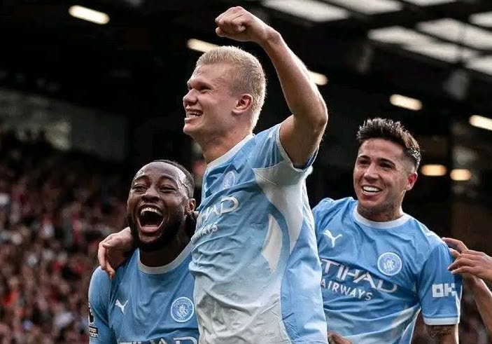 Manchester City players celebrate after Erling Haaland scores against Sunderland.