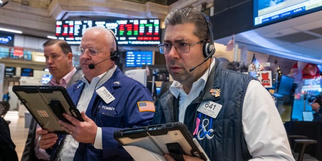 raders at the New York Stock Exchange as U.S. bond yields and mortgage rates rise.