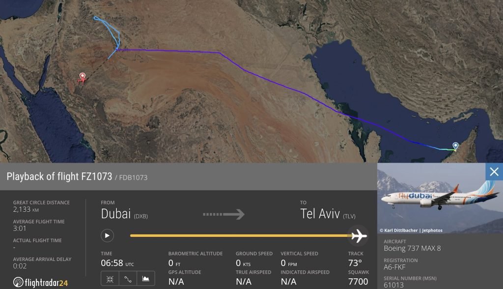 A flight-tracking map showing an aircraft's diverted flight path between Dubai and Saudi Arabia.