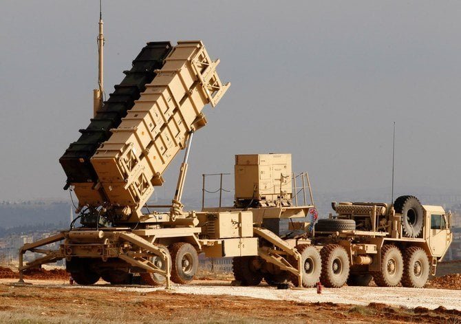 A missile defense launcher pointed skyward at dusk.