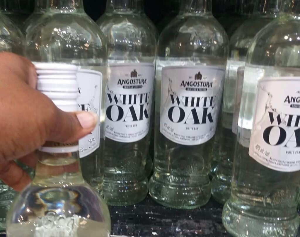 Bottles of alcohol displayed on a store shelf.