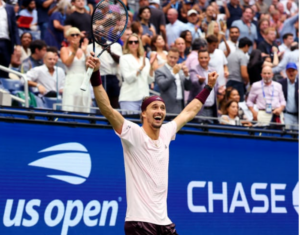 Alexander Zverev holding the US Open trophy after winning the men’s singles final in New York.