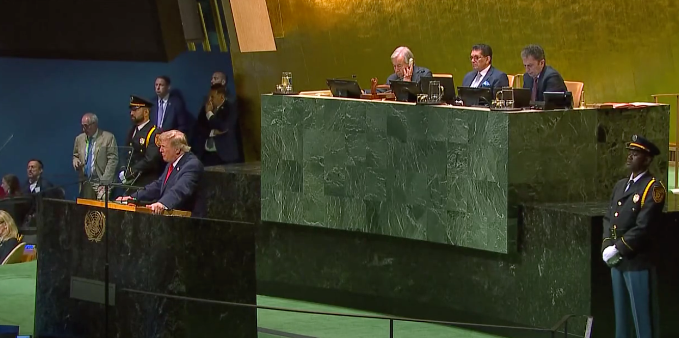 Donald Trump speaks from the United Nations General Assembly podium as delegates sit in the chamber.