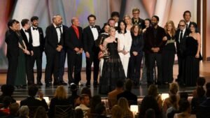 Cast and creators of Widow’s Bay standing on the Emmy Awards stage after winning Outstanding Comedy Series.