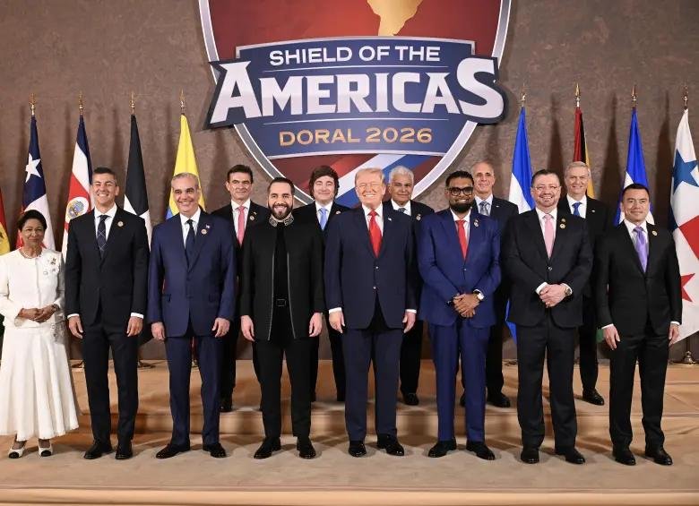 Kamla Persad-Bissessar and Donald Trump at the Shield of the Americas Summit in Miami