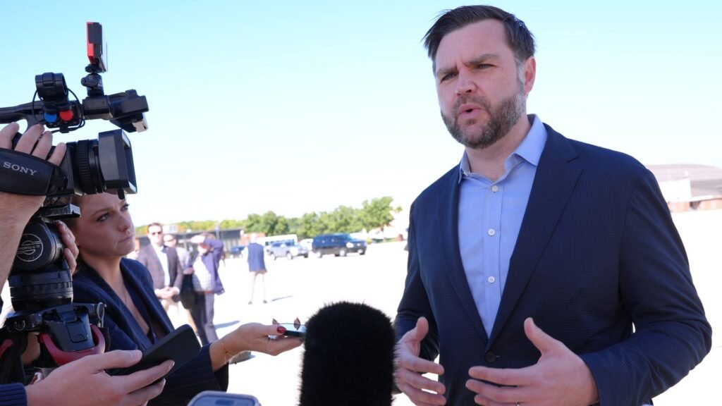 Vance speaking to reporters