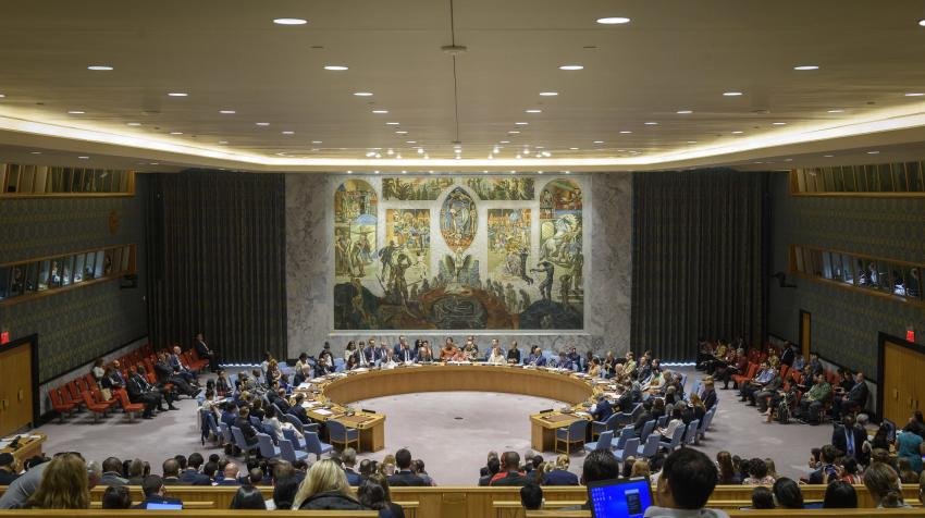 Delegates seated around the Security Council horseshoe table.
