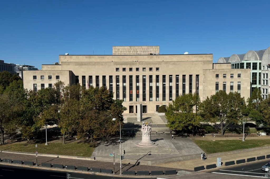 The exterior of a federal courthouse with columns.