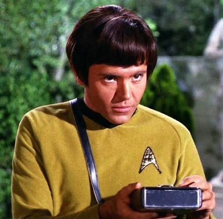 A young man in a gold Starfleet uniform