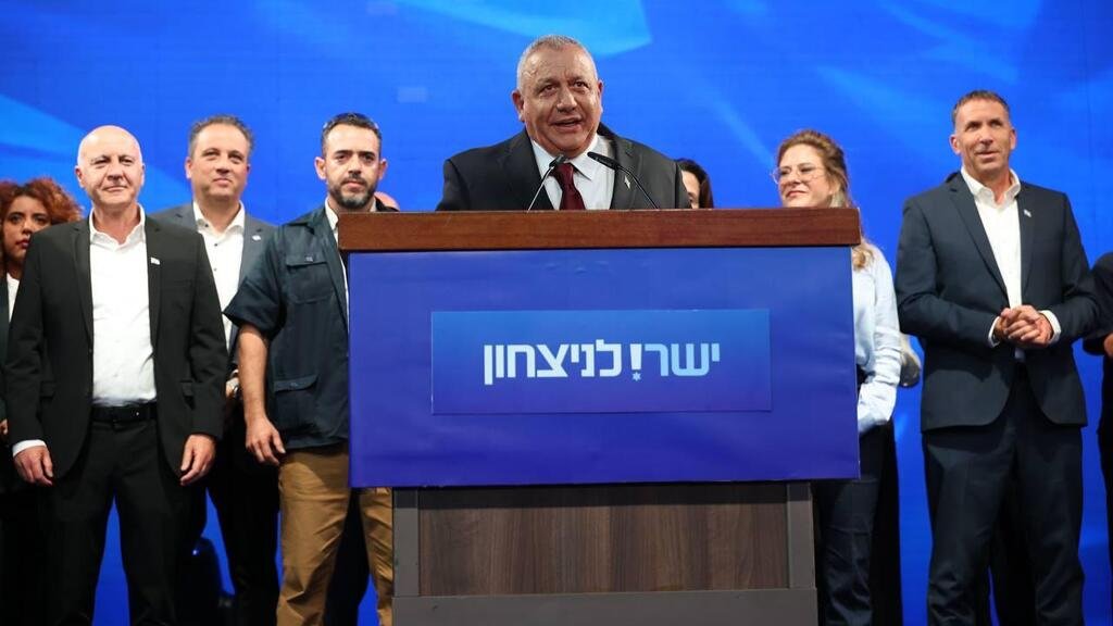 Gadi Eisenkot in a dark suit speaking at a podium.