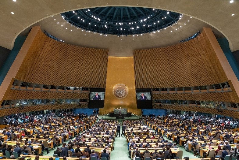 Delegates seated in the General Assembly hall.