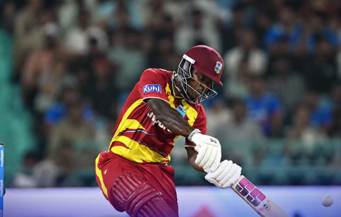 Sherfane Rutherford plays a shot during West Indies’ T20 match against India.