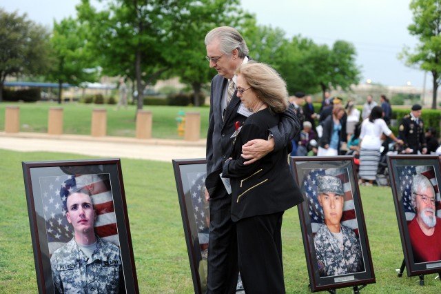 Memorial at Fort Hood with markers honoring the victims of the 2009 shooting.